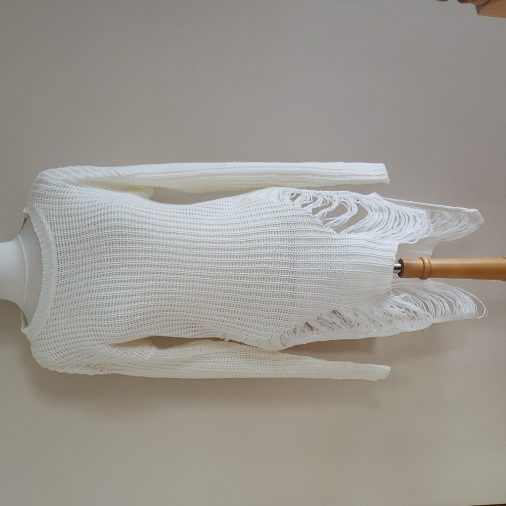 Distressed knit sweater